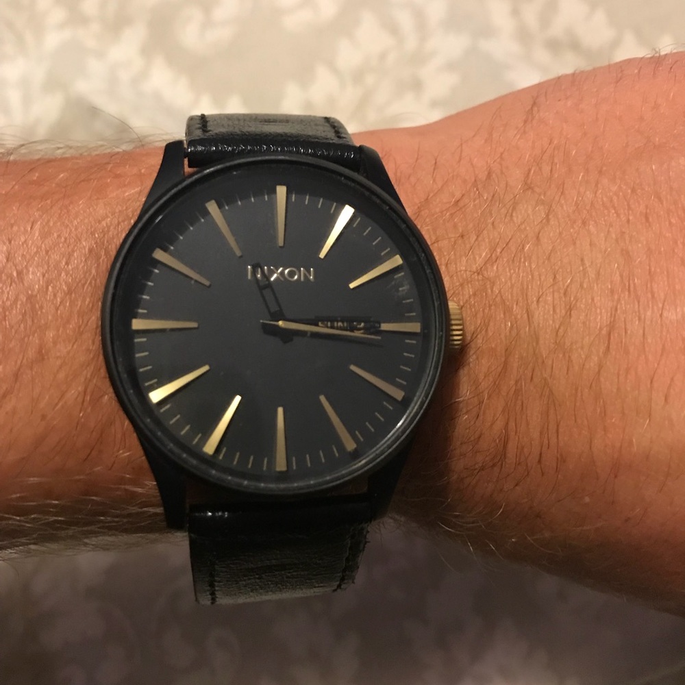 Black and Gold Nixon Watch